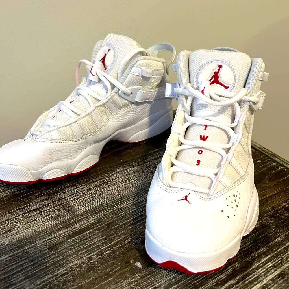 Red and white Nike Jordan’s size 7. 1/2 very clean only worn once